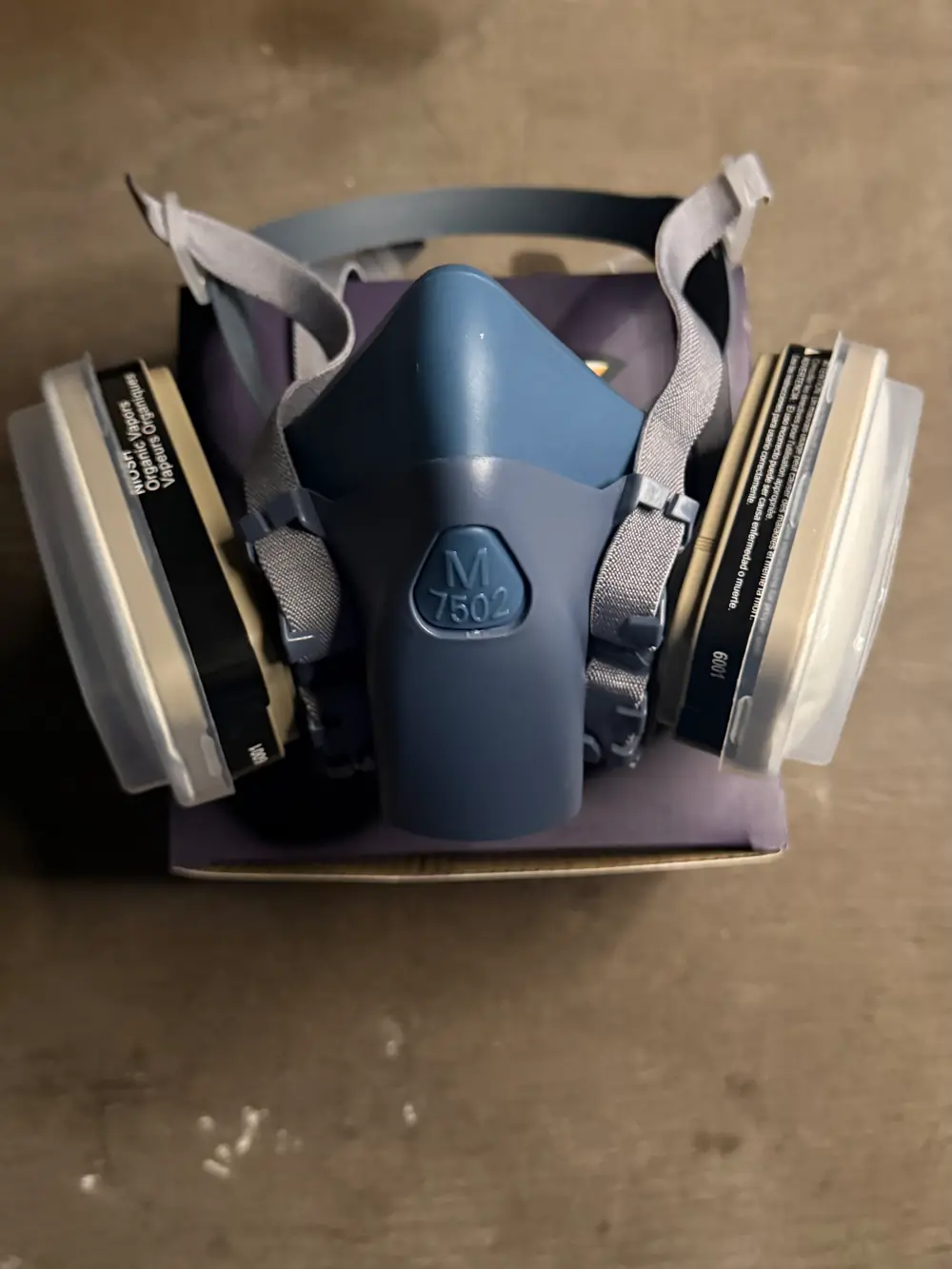 Torxup CoreMask from above, showing the face seal, head harness and both filter cartridges.